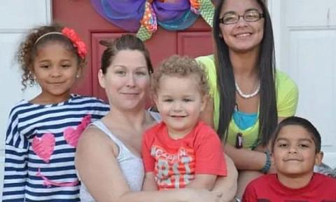 Naz pictured with her late mother and siblings.