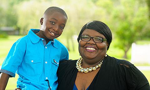 Aunt and nephew smiling