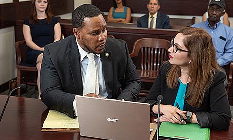 Attorneys discussing a case