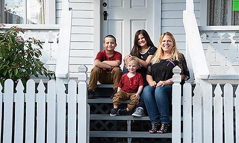 Family Sitting on Front Porch Steps