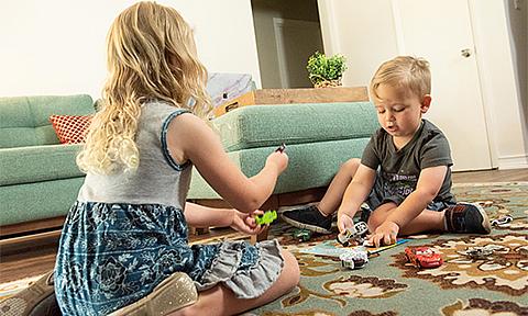 Two children playing with toys