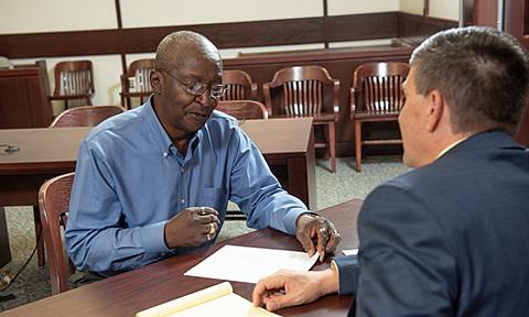 Attorney helping a senior client