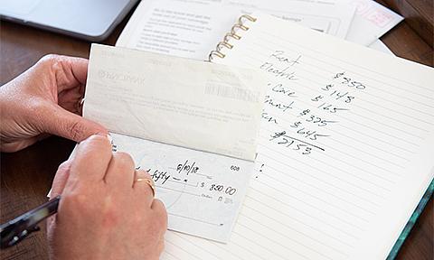 Woman paying bills