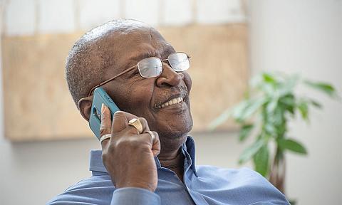 Veterans Client Talking on Mobile Phone